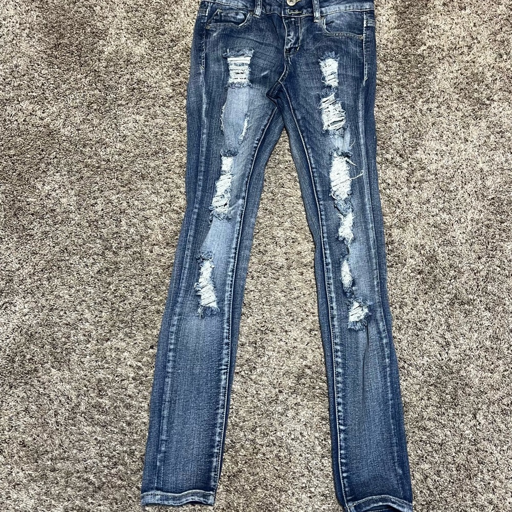 Distressed Blue Jeans